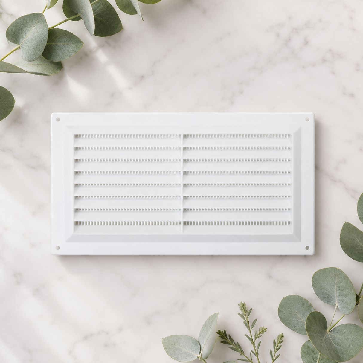 White plastic 9x6 louvre vent grille with visible internal flyscreen mesh