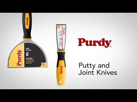 Purdy Flex Carbon Steel Putty Knife in use during decorating prep work