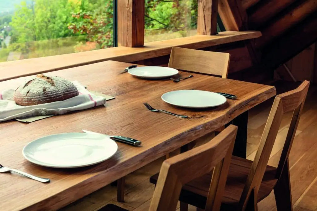 Wooden dining table finished with a warm natural oil finish