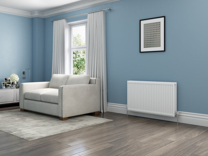 Chrome heated towel rail radiator in a bathroom