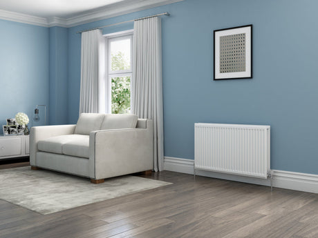 Chrome heated towel rail radiator in a bathroom