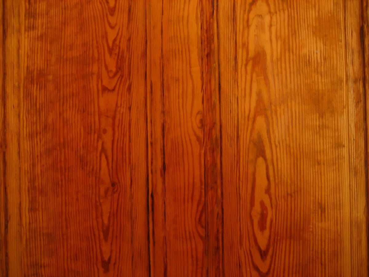 Rich, deep coloured wood furniture built up with multiple coats of oil finish