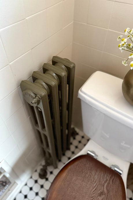 Freshly painted radiator left to dry undisturbed