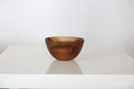 Finished wooden bowl with an oiled food safe finish