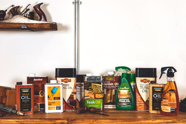 Traditional wood finishing oils including Danish oil arranged for comparison