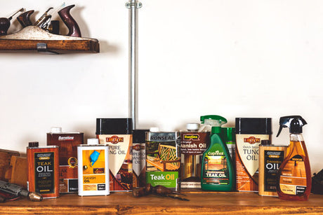 Traditional wood finishing oils including Danish oil arranged for comparison