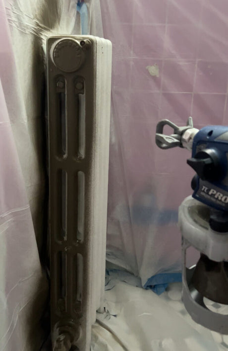 Spray painting a radiator with an aerosol can for a smooth finish