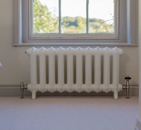 Painting a cast iron radiator by hand