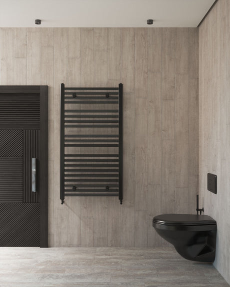 Modern bathroom with a black toilet, wall mounted radiator and wood panelled walls