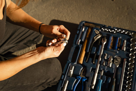Close up of hands using hand tools during a home fitting job