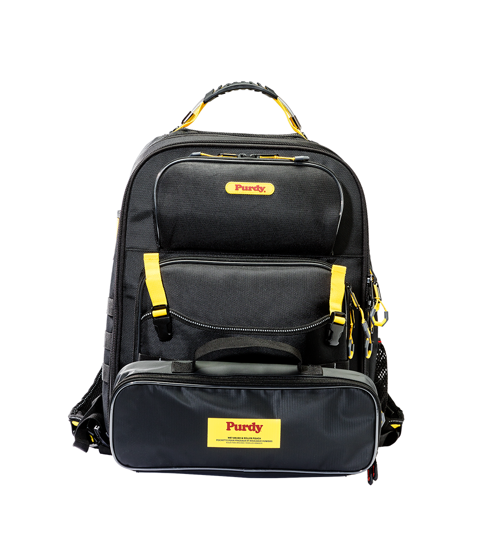 Purdy Painters Backpack shown open with brush and roller pockets visible