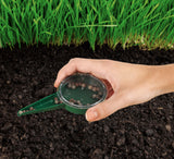 Ambassador dial seed sower, a handheld gardening tool with a rotating dial used to sow individual seeds evenly spaced.