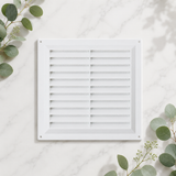 White plastic 9x9 louvre vent grille with visible internal flyscreen mesh