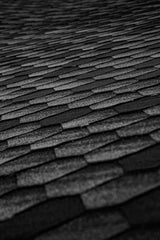 Black paving with dark jointing compound between the joints