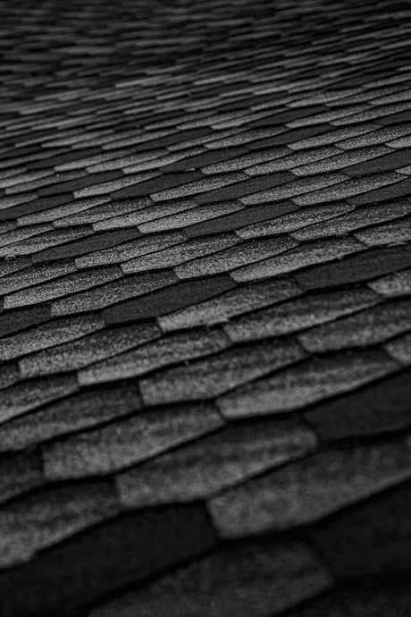 Black paving with dark jointing compound between the joints