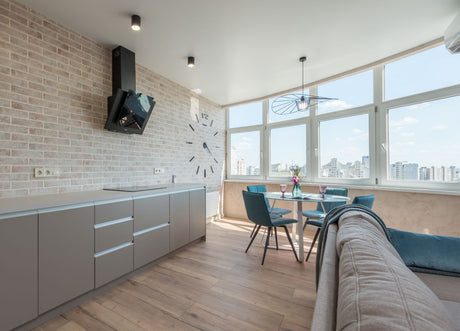 Stylish studio kitchen in a beige pastel colour scheme like Dulux Egyptian Cotton