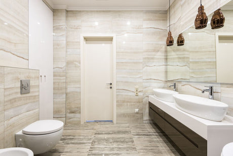 Luxurious bathroom with beige tiles and dual sinks, matching Dulux Egyptian Cotton