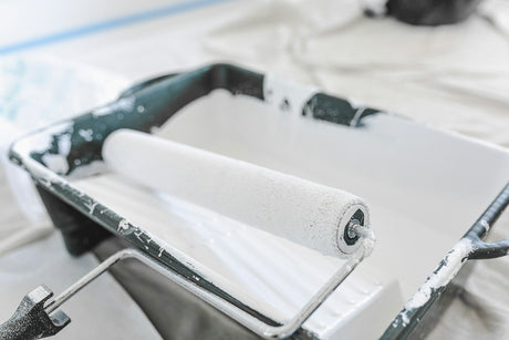Close up of a paint roller nap showing the dense woven fabric texture of a Purdy Colossus sleeve