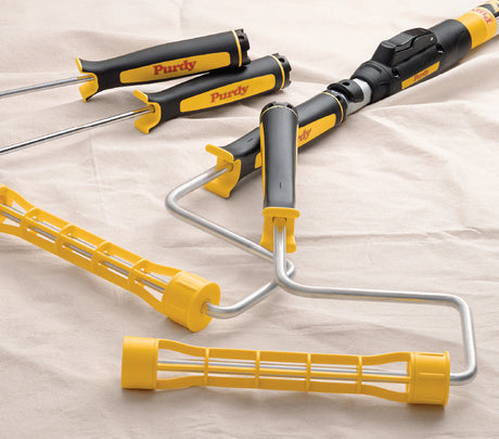 Purdy roller frames and extension poles displayed together as a decorating tool set