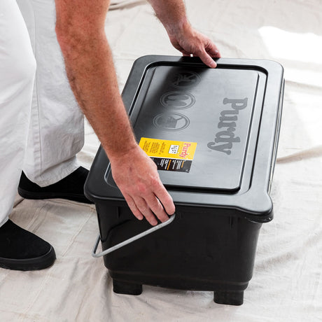 Purdy Dual Roll Off bucket lid underside showing the airtight seal clips