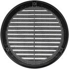 Black round air vent louver cover fitted into a soffit panel